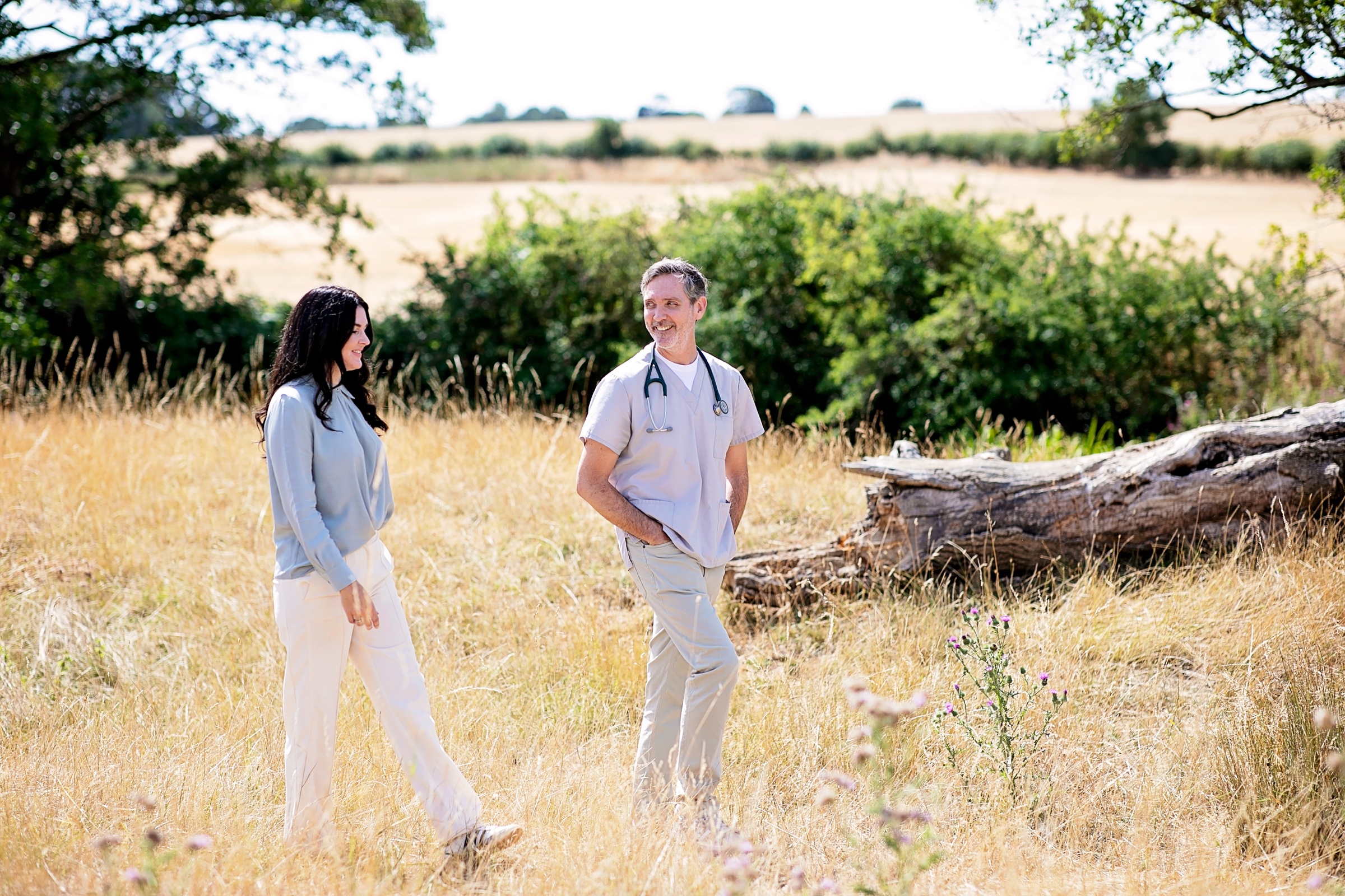 Mark and Kellie, the VetYourSelf founders, walking together outdoors